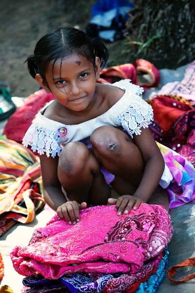 Little Girl working at anjuna flea market goa