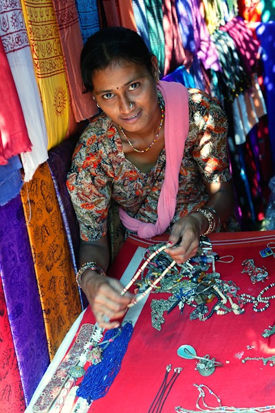 Lady selling from a stall at Anjuna Flea Market GOA