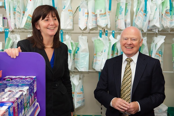 lesley griffiths mp for wales smiling in front of rowlands perscription dispensing area