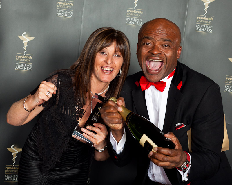 Rowland Pharmacy Outstanding Achievement Award - Paula Hansard with Kriss akabusi