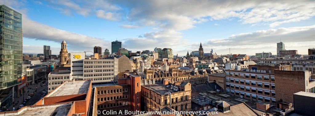 Manchester Skyline Panorama features Manchester Town Hall viewed from Blackfriars roof top garden