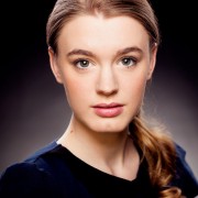 Amy Kelly looking beautiful in this studio headshot