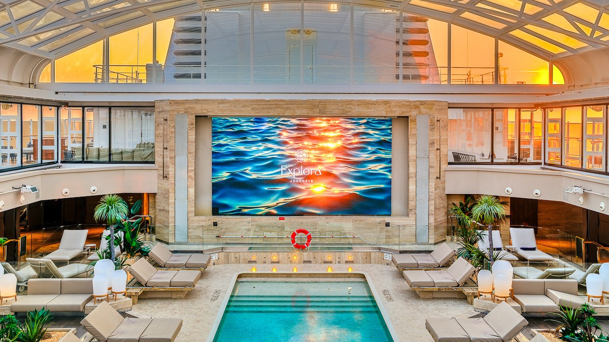 Big screen pool area explora one at sunrise