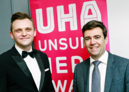 Andy Burnham and Mark Cherry UHA awards banner